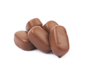 Obraz na płótnie Canvas Chocolate coated toffee candy isolated