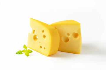 wedges of yellow cheese with eyes