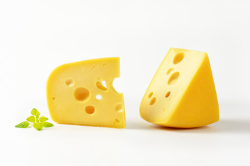 wedges of yellow cheese with eyes