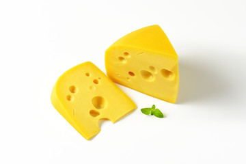wedges of yellow cheese with eyes
