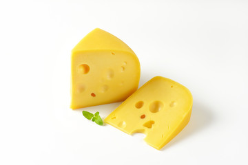 wedges of yellow cheese with eyes
