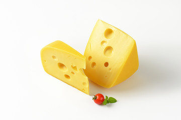 wedges of yellow cheese with eyes