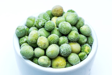 Frozen green peas close-up