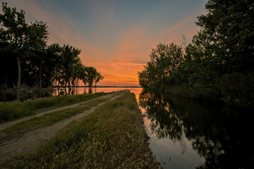 Road to nowhere leans into a lake in Idaho