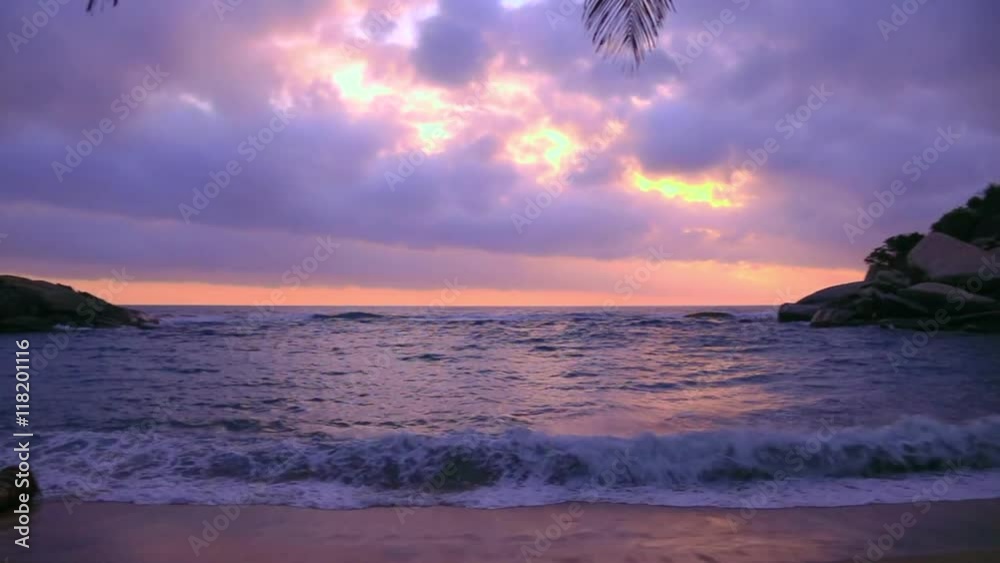 Sticker purple sunrise on a paradisiac beach - cabo san juan, tayrona national park, colombia