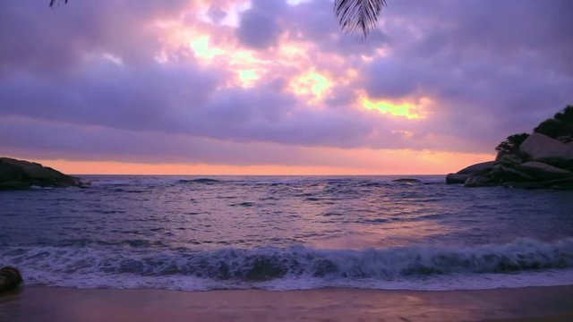 Purple sunrise on a paradisiac beach  - Cabo San Juan, Tayrona National Park, Colombia