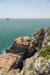 View of Sinseon Rock, rocky and steep cliff and ocean at the Taejongdae Resort Park in Busan, South Korea.