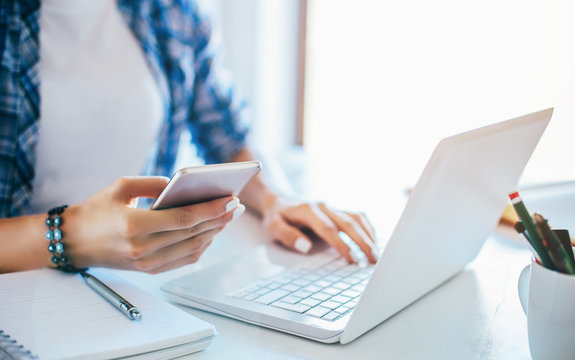 Young businesswoman using smart phone