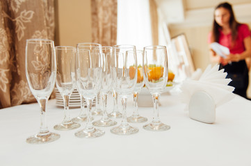 Wedding glasses filled with champagne at banquet