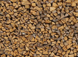 firewood pile up wooden wall