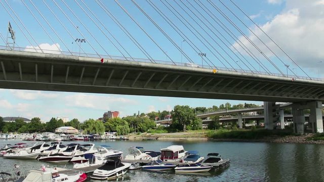 Hot summer day in a city - Traffic at New Bridge in Belgrade, Serbia; named " Most na Adi"; Balkan's side of town; 