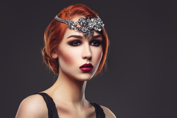 Beautiful girl with smoky eyes and red lips