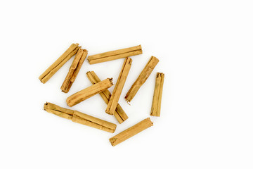 Cinnamon sticks on white