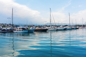 Fototapeta na wymiar boats in the harbor of Antibes, France