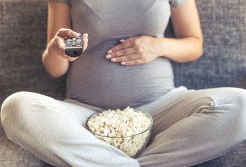 Beautiful pregnant woman at home