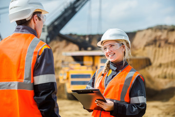 Two people working