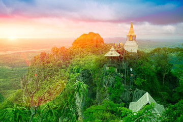 Beautiful Mountain Temple in Lampang, North of Thailand, Unseen in Thailand, Pagoda on Top of Rock Cliff. - obrazy, fototapety, plakaty