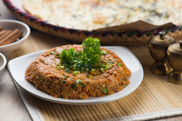 oqda , fried potatoes with meat popular arab food