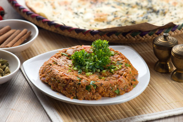 oqda , fried potatoes with meat popular arab food