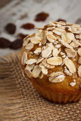 Fresh muffin with oatmeal baked with wholemeal flour and raisins, delicious healthy dessert