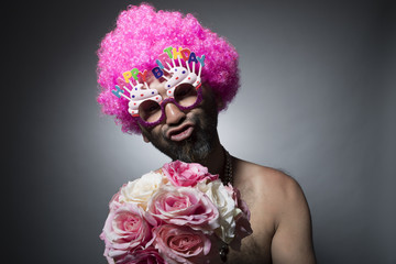 Men of pink afro hair that is celebrating a birthday