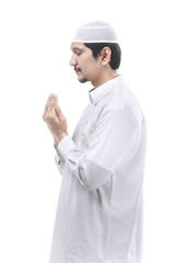 Young man asian muslim praying