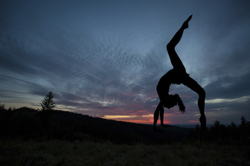 Yoga practicioner during the sunse