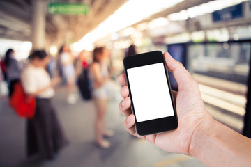 Person using smartphone white screen holder on hand with  blurre