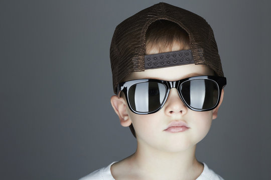 little boy. fashion children.handsome in sunglasses and Cap