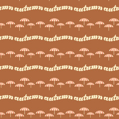 Autumn background with leaves and umbrellas. Lettering seamless pattern.