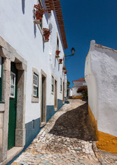View to Historic narrow street Obidos in Portugal