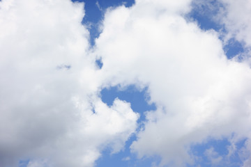 Obraz premium the white clouds floating on a background of blue sky