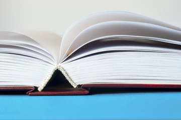 Open book on light table. Back to school. Copy space