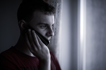 Teenager speaking on mobile phone