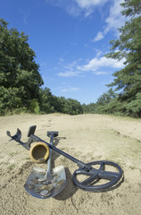 Treasure ancient coins dug out of the ground.