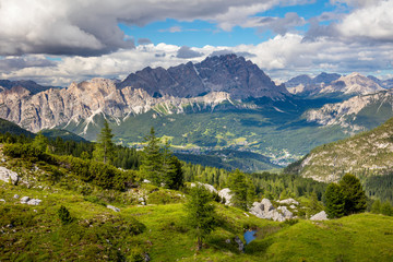 Fototapeta na wymiar Summer Mountain Landscape with big peaks of Dolomites and trees,