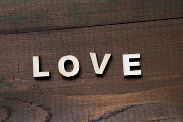 high resolution dark village wood backgrounds. The word love. Copy space