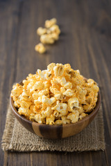 popcorn in wooden bowl