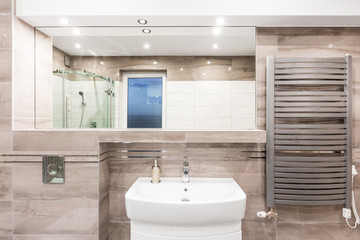 Beige bathroom with heater idea