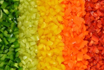 Multicolored stripes of five varieties sweet peppers, collected in gradient rainbow background