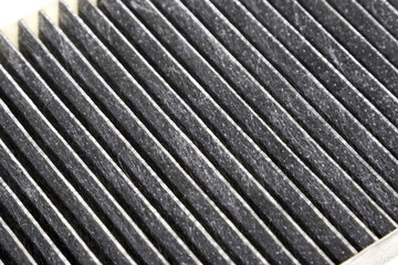 Dirty automobile filter. Selective focus with shallow depth of field.