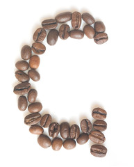 Letter G made of coffee beans under a daylight isolated on white background