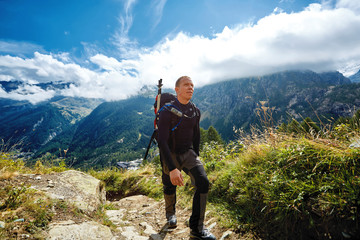 hiker in the Apls mountains. Trek near Matterhorn mount