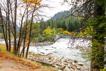 Hiking. Beautiful landscape. View of stream Dam at mountains
