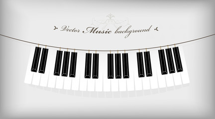 Fototapeta premium Hanging piano keyboard with place for your text.