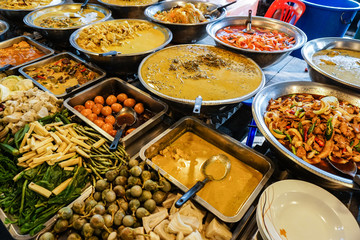 Asian night food market. Prepared cooked ready to eat take away dishes