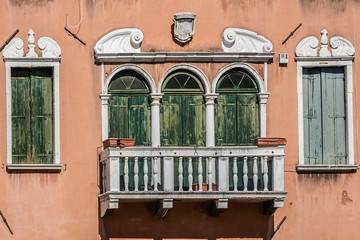 Detail of facade of traditional old Venetian house. Italy.