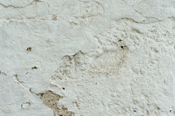 Wall fragment with attritions and cracks