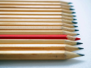 Fototapeta premium Being Different Concept with Wooden Pencils Arranged in a Row