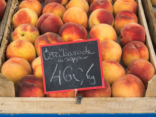 Fresh peaches at a farmers market